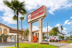 a sign for a shopping mall with a palm tree at Best Western Plus Ontario Airport & Convention Center in Ontario