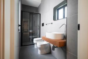 Ένα μπάνιο στο Atto Primo - B&B Experience