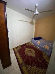 Postel nebo postele na pokoji v ubytování الزعتري هوستل
