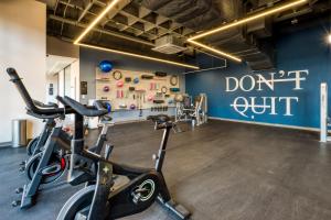 a gym with two exercise bikes in a room at ULIV Cibeles in Mexico City