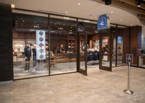 a store front with people in the windows of a store at Spokane Tribe Resort and Casino in Airway Heights +22 photos