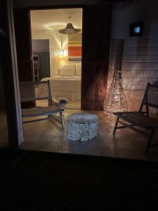 Posedenie v ubytovaní Les Cabanes cosy à 2 pas du lagon - charme et confort