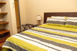 Katil atau katil-katil dalam bilik di Almond Tree Villa Beach Hideaway with Jacuzzi