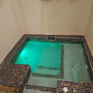 Kolam renang di atau dekat dengan Almond Tree Villa Beach Hideaway with Jacuzzi
