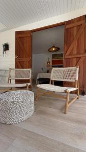Posedenie v ubytovaní Les Cabanes cosy à 2 pas du lagon - charme et confort