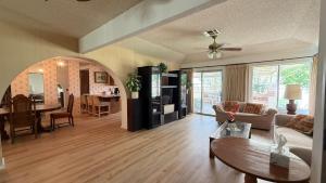 a living room with a couch and a table at Perfect Coachella Getaway! in Indio