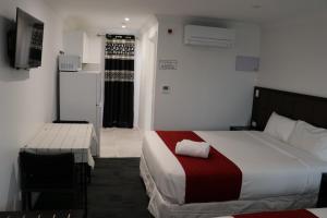 Postel nebo postele na pokoji v ubytování Krishna Motel - Newly Built in Papakura
