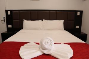 Postel nebo postele na pokoji v ubytování Krishna Motel - Newly Built in Papakura