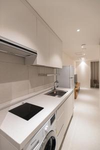 Kuchyň nebo kuchyňský kout v ubytování Hotel Modak Namdaemun