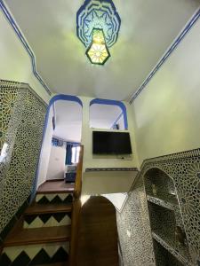 Et tv og/eller underholdning på Meftah’s house