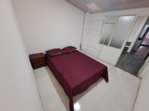 Postel nebo postele na pokoji v ubytování viajeros tour Apartamento cerca al centro