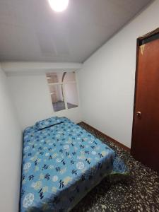 Postel nebo postele na pokoji v ubytování viajeros tour Apartamento cerca al centro