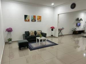 Posezení v ubytování Mummy Firdhan Homestay