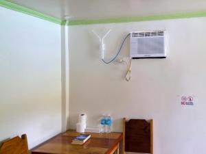 TV a/nebo společenská místnost v ubytování Mariden Resort & Homestay Siargao