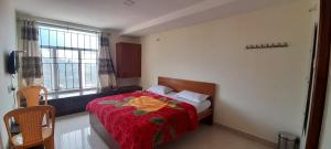 Ένα ή περισσότερα κρεβάτια σε δωμάτιο στο Happy Valley Inn +8 φωτογραφίες