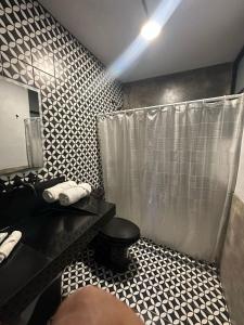 Koupelna v ubytování Suites Santa Noche & Spa