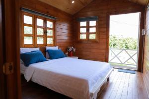 Postel nebo postele na pokoji v ubytování Healing Space Bungallow Bao Loc + 27 fotografií