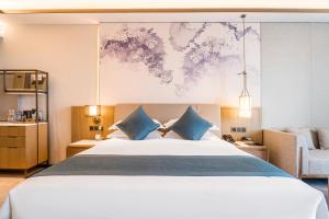 Shuyang Honor International Hotel客房内的一张或多张床位