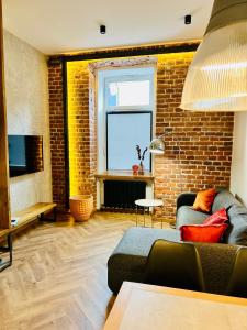 TV a/nebo společenská místnost v ubytování ART DESIGN APARTMENT 2b