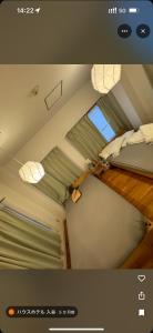 a room with two beds and a window at househotel上野 入谷 in Tokyo +29 photos