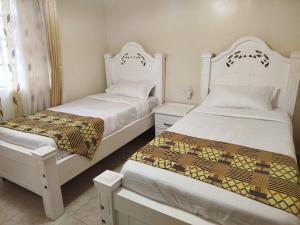Postel nebo postele na pokoji v ubytování Tevari Holiday Villas