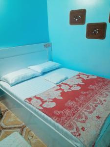 Postel nebo postele na pokoji v ubytování S I Guesthouse