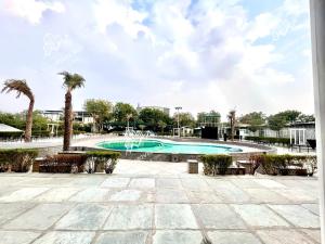 Bazén v ubytování THE TRADEFAIR - RESORT AND SPA, Jaipur nebo v jeho okolí