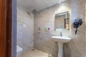 Baðherbergi á Amarawati Boutique Hotel