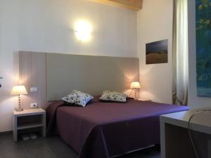 Postel nebo postele na pokoji v ubytování Affittacamere Da Flo