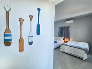 Eco House Gaivota - Cond Ville Portal das Dunas客房内的一张或多张床位