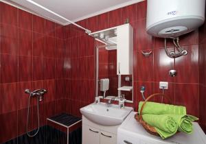 Kúpeľňa v ubytovaní Apartments Solitudo