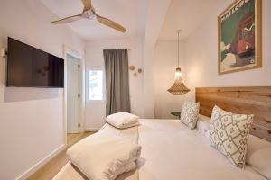 Postel nebo postele na pokoji v ubytování INNER Hostal Es Molí