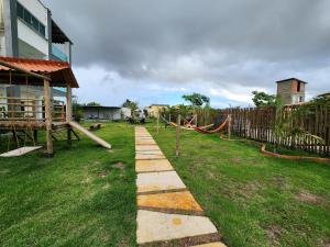 Eco House Gaivota - Cond Ville Portal das Dunas外面的花园
