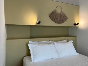 A bed or beds in a room at Dimora di Dante