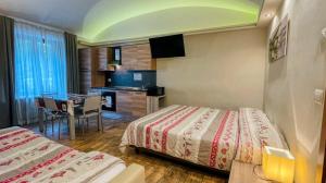 Postel nebo postele na pokoji v ubytování Residence Tabor