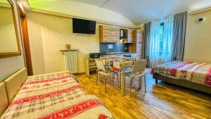 Postel nebo postele na pokoji v ubytování Residence Tabor