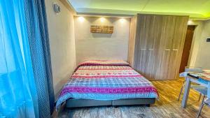 Postel nebo postele na pokoji v ubytování Residence Tabor