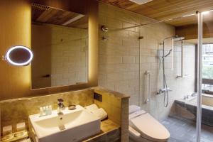 Ένα μπάνιο στο Kilin Hotel, JiaoXi