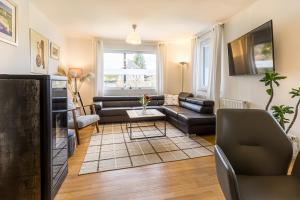 Ein Sitzbereich in der Unterkunft Velden - Villa right in the center with private parking