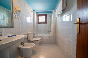 Ванная комната в Hotel Buigues