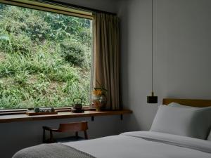 稷上青城山墅客房内的一张或多张床位