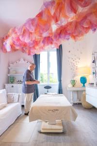 A bed or beds in a room at Ca' de Tobia
