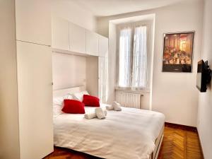 Un pat sau paturi într-o cameră la Urban Oasis Milano Centrale