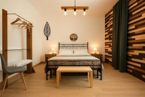 A bed or beds in a room at Camurria Sicilian B&B