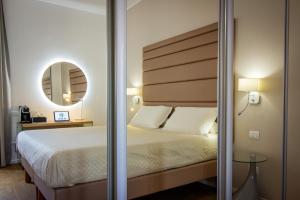Posteľ alebo postele v izbe v ubytovaní Album Boutique Rooms