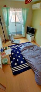 Clear Up Guest House客房内的一张或多张床位