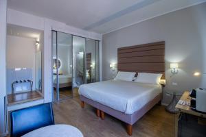Posteľ alebo postele v izbe v ubytovaní Album Boutique Rooms