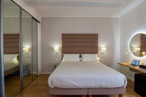 Posteľ alebo postele v izbe v ubytovaní Album Boutique Rooms