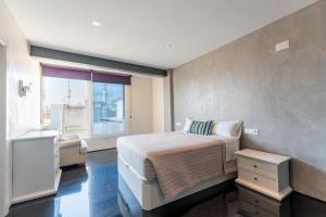 Кровать или кровати в номере Hotel Buigues