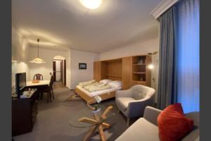 TV a/nebo společenská místnost v ubytování Haus Dwarslöper, Ferienwohnung 3